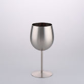 Artisan stainless steel chalice called The Sovereign Stem by WoodyKitchenware, featuring a sleek, polished design.