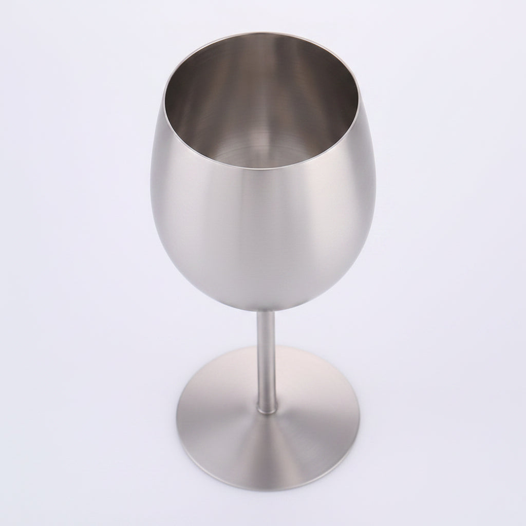 Artisan stainless steel chalice called The Sovereign Stem by WoodyKitchenware, featuring a sleek, polished design on a plain background.