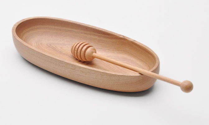 Wooden long handle honey coffee stirrer by WoodyKitchenware, made of elegant beechwood for mixing hot beverages.