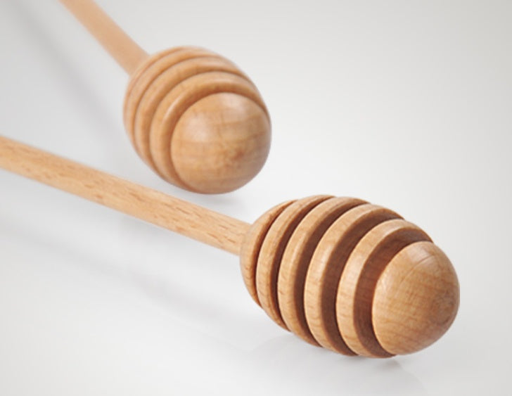 Wooden long handle honey coffee stirrer by WoodyKitchenware, elegant beechwood mixing spoon for stirring beverages.