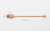 Wooden long handle honey coffee stirrer by WoodyKitchenware, elegant beechwood mixing spoon for stirring beverages.