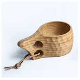 Hand-carved irregular wooden vessel from WoodyKitchenware featuring unique, natural wood grain and rustic craftsmanship.