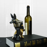 Resin Anubis Dog-God wine rack ornament by WoodyKitchenware, depicting a mystical Anubis figure holding a wine bottle in its paws.