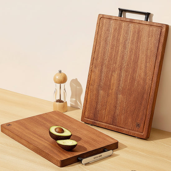 Dark ebony cutting board by WoodyKitchenware, 28x18cm solid ebony timber with a smooth, polished finish for kitchen use.