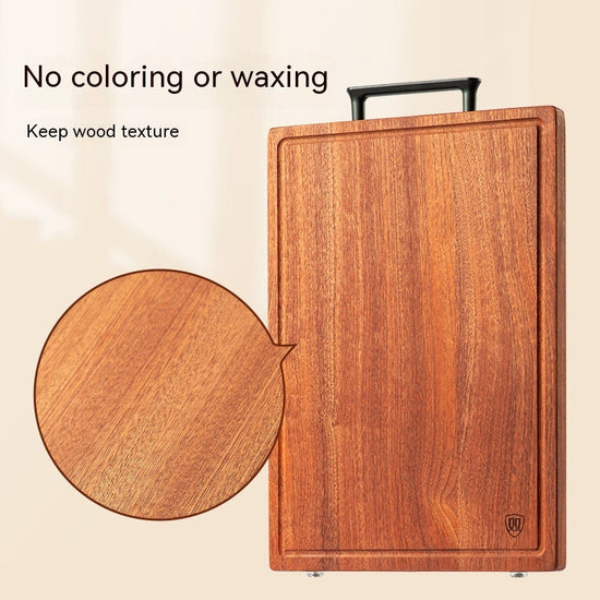 Dark ebony cutting board by WoodyKitchenware, solid ebony timber, 28x18x2.5cm, featuring a sleek, polished surface for kitchen use.