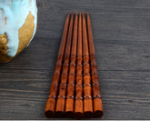 Pair of Fired Bamboo Chopsticks by WoodyKitchenware, durable and eco-friendly dining utensils with a smooth finish and natural bamboo look.