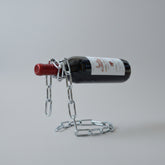 Suspended wrought iron chain red wine shelf by Woody&