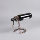 Wrought iron red wine shelf with suspended chain design by Woody&