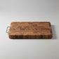 Double-sided wooden chopping board with handle, featuring large square surface and dual-surface design by WoodyKitchenware.