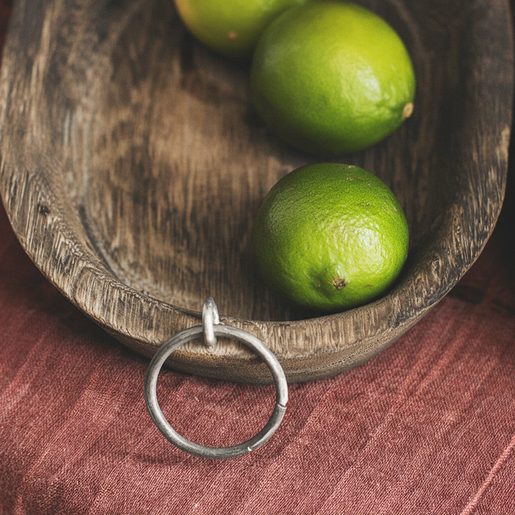 Charred oak oval serving tray made of Paulownia wood by WoodyKitchenware, featuring a unique Yakisugi burnt finish.