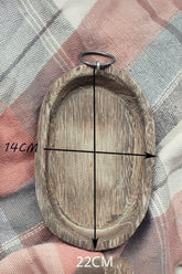 Charred Paulownia wood serving tray by WoodyKitchenware, oval-shaped with a rustic charred finish, perfect for serving or display.