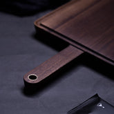 Wooden chopping board with groove and juice channel by WoodyKitchenware, featuring a square maple design for bread and food prep.