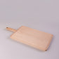 Square wooden chopping board with juice groove for bread, made by WoodyKitchenware, featuring a smooth maple surface and functional design.