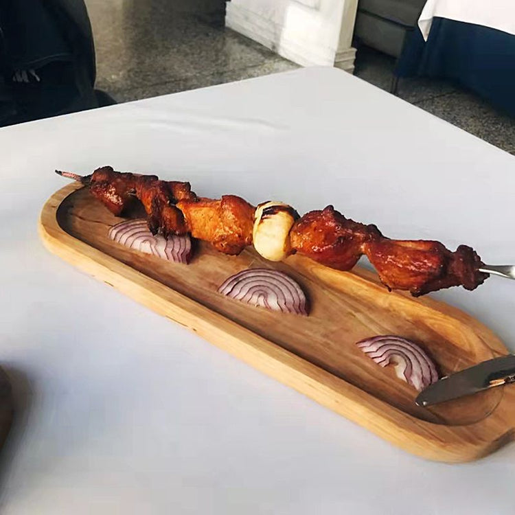Wooden restaurant board from WoodyKitchenware, featuring a solid timber steakhouse skewer stage for serving food.