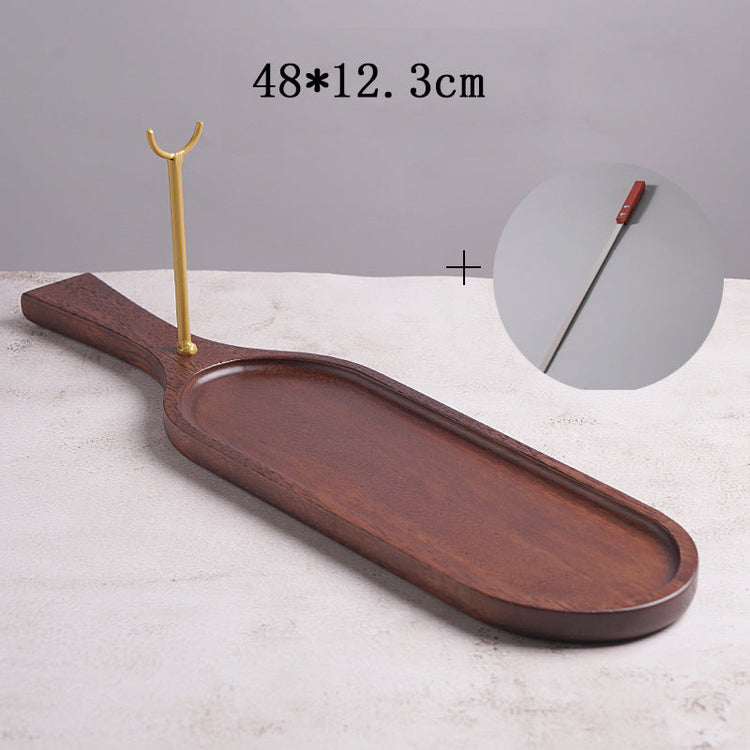 Wooden restaurant board by WoodyKitchenware, used as a steakhouse skewer stage, made of solid timber for tableware presentation.
