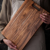 Square Acacia chopping board by WoodyKitchenware featuring solid timber, perfect for steakhouse-style food preparation.