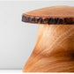 Solid timber mushroom wood ornament by WoodyKitchenware, featuring natural wood grain and a smooth, rounded mushroom shape.