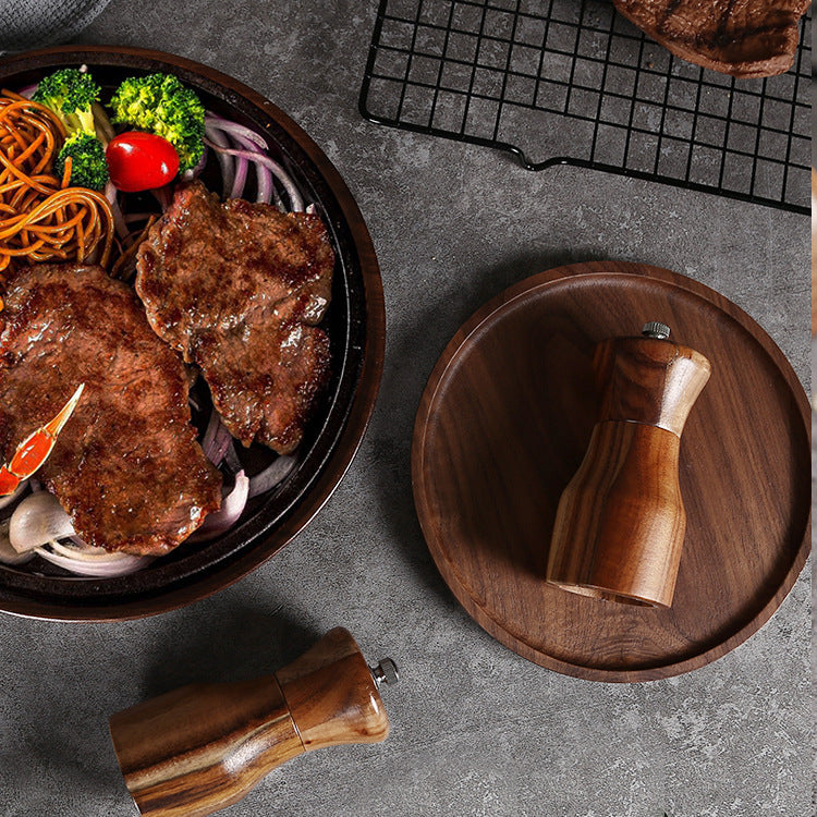 Wooden manual pepper grinder by WoodyKitchenware, Pylon Solid Timber Mill for fresh-ground pepper seasoning.