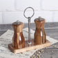 Manual pepper grinder by WoodyKitchenware, made of solid timber with a sleek design for fresh-flavor seasoning.