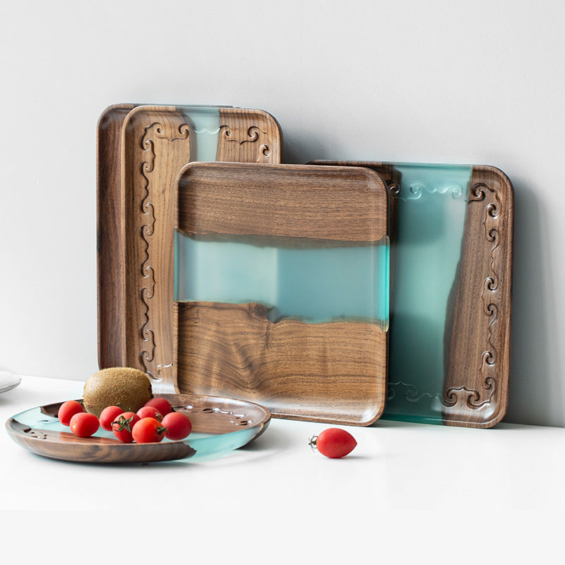 Black walnut tea tray by WoodyKitchenware, featuring a river-inspired solid timber design for traditional tea serving.