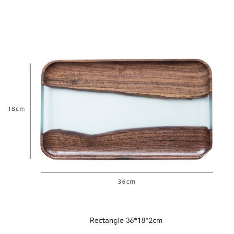 Black walnut tea tray by WoodyKitchenware, featuring a river-inspired solid timber design for elegant tea serving.