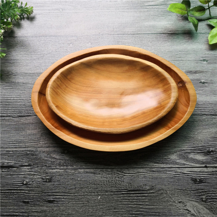 Wooden oval compote plate by WoodyKitchenware, solid timber serving platter with smooth finish and natural wood grain.