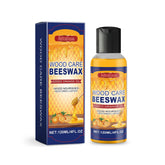 WoodyKitchenware Natural Beeswax Care Spray and Restorer for wood, featuring a spray bottle with beeswax formula and wooden surface.