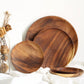 Unfinished acacia solid wood round plates by WoodyKitchenware, natural wooden dishware with a smooth, raw wood finish.
