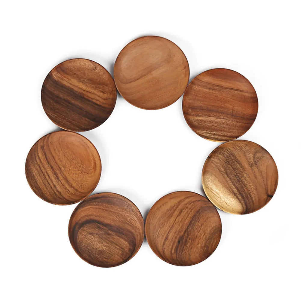 Unfinished acacia solid wood round plates by WoodyKitchenware, showcasing natural wood grain and smooth, unpolished surface.