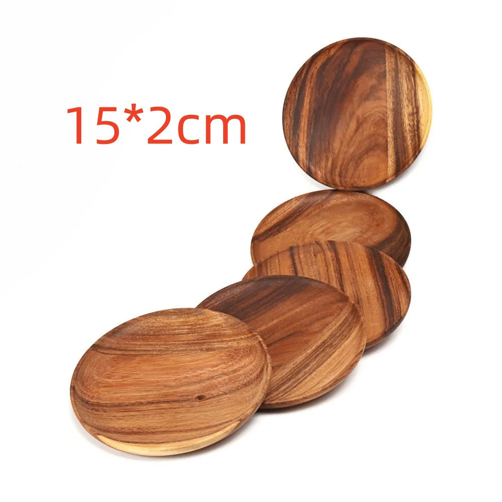 Unfinished acacia solid wood round plates by WoodyKitchenware, natural wooden dishware with a smooth, raw wood finish.