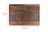 Round black walnut wood cutting board by WoodyKitchenware, perfect as a creative kitchen tray with natural wood grain details.