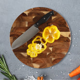 Round solid wood splicing cutting board by WoodyKitchenware, showcasing natural wood grain and craftsmanship for kitchen use.