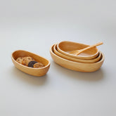 Large oval wooden bowl by WoodyKitchenware, featuring minimalist boat curve design in solid timber for salad or serving.