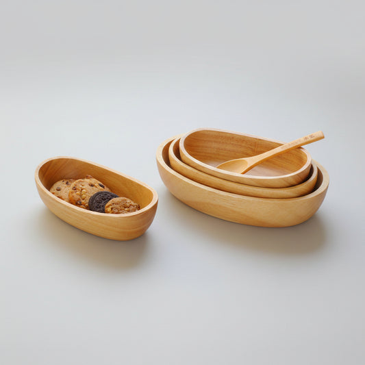 Large oval wooden bowl by WoodyKitchenware, featuring minimalist boat curve design in solid timber for salad or serving.