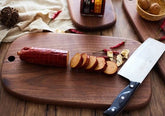 Black Walnut chopping board from WoodyKitchenware, showing a smooth, natural wood surface ideal for kitchen food prep.