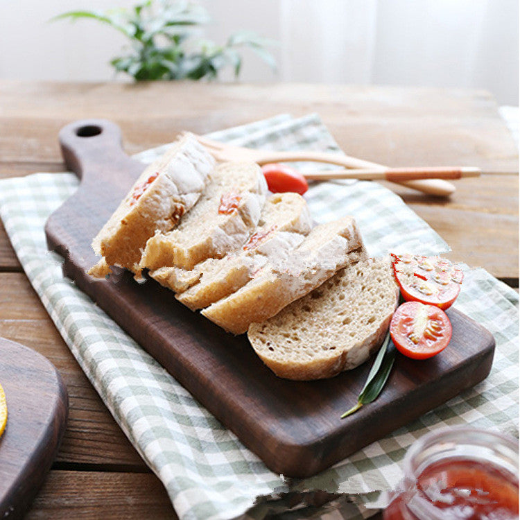 Black Walnut chopping board from WoodyKitchenware with natural wood grain, rectangular shape, and smooth finish for kitchen prep.