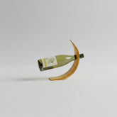 Bamboo wine bottle rack by WoodyKitchenware featuring a semi-circle creative shelf design for stylish kitchen storage.