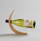 Creative bamboo wine bottle rack by WoodyKitchenware, semi-circle style bamboo shelf for organizing wine bottles.