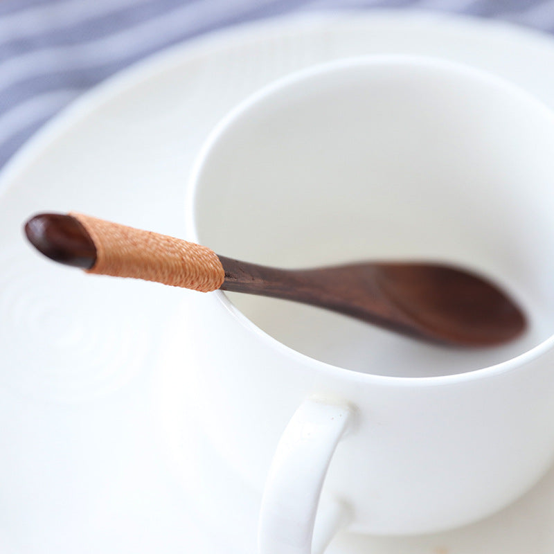 Set of six eco-friendly wooden baby spoons from WoodyKitchenware, gentle and natural feeding utensils for infants.