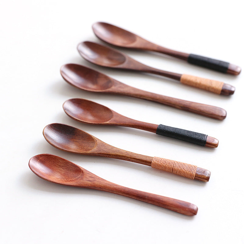 Set of six wooden baby spoons from WoodyKitchenware, gentle, eco-friendly feeding utensils perfect for infants.