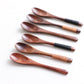 Set of six wooden baby spoons from WoodyKitchenware, gentle, eco-friendly feeding utensils perfect for infants.