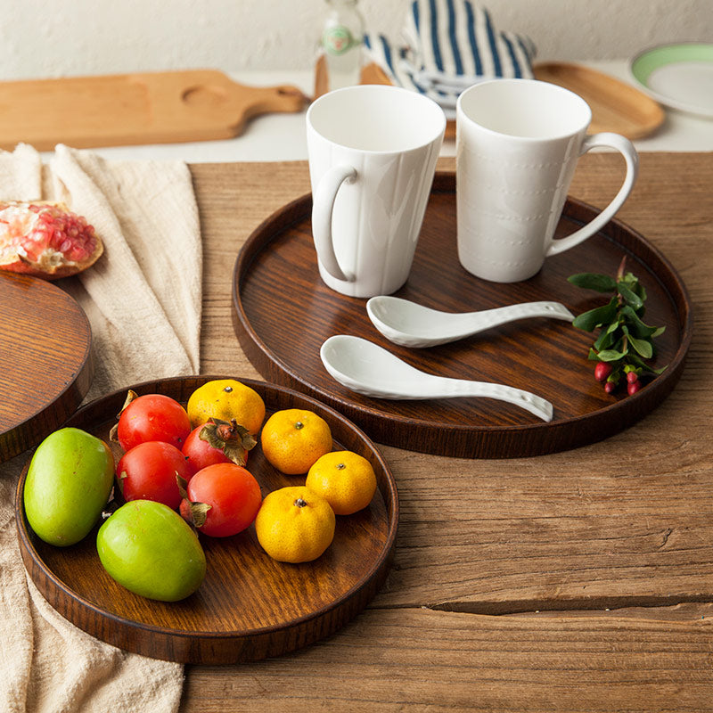 Round wooden tray by WoodyKitchenware, solid timber centerpiece in natural finish, 24cm diameter for serving or display.
