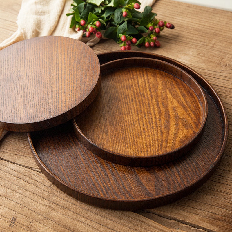 Round wooden tray by WoodyKitchenware, solid timber centerpiece with a natural finish, 24cm diameter, ideal for serving or display.