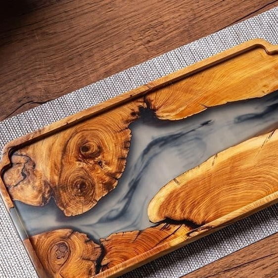 Elegant rectangular bamboo wooden tea tray with epoxy resin accents, perfect for serving tea in a stylish, natural design by WoodyKitchenware.