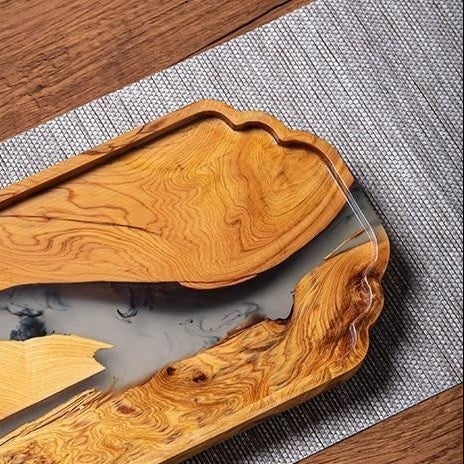 Elegant bamboo and resin rectangular wooden tea tray by WoodyKitchenware, featuring epoxy-enhanced dry finish for a refined look.