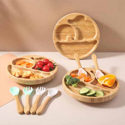 Eco-friendly wooden feeding bowls for children from WoodyKitchenware, made of bamboo in a colorful, child-safe dinnerware set.