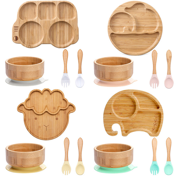Eco-friendly wooden feeding bowls for children from WoodyKitchenware, made of bamboo in a colorful dinnerware set.