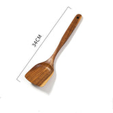 Wooden spatula by WoodyKitchenware, teak stir-fry sword made of solid timber for kitchen cooking and stir-fry preparation.