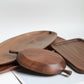 Wooden saucer fruit tray by WoodyKitchenware featuring natural wood grain, perfect for elegant fruit display and dining presentation.