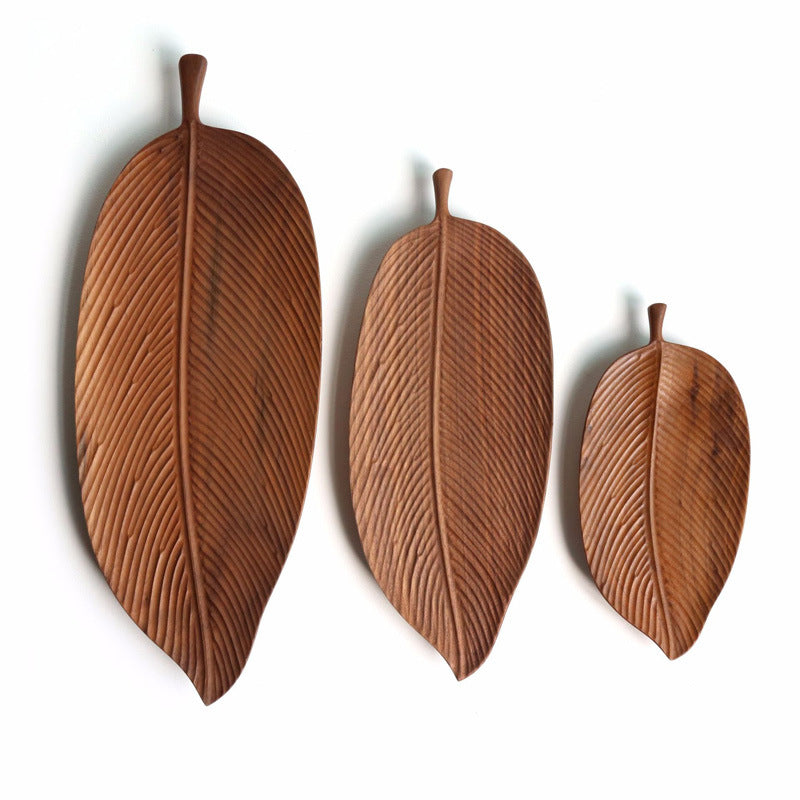 Wooden saucer fruit tray by WoodyKitchenware, featuring natural wood grain and elegant design for serving fruits and snacks.